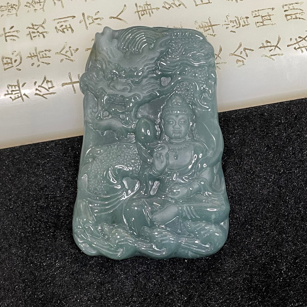 Type A Blueish Green Guan Yin & Dragon Jade Jadeite 56.14g 66.6 by 44.3 by 9.3mm - Huangs Jadeite and Jewelry Pte Ltd