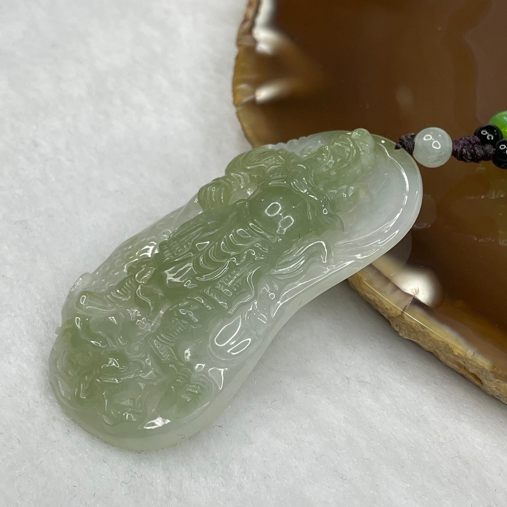 Grand Master Type A Semi Icy Guan Gong & Dragon 32.24g 58.8 by 29.8 by 9mm - Huangs Jadeite and Jewelry Pte Ltd