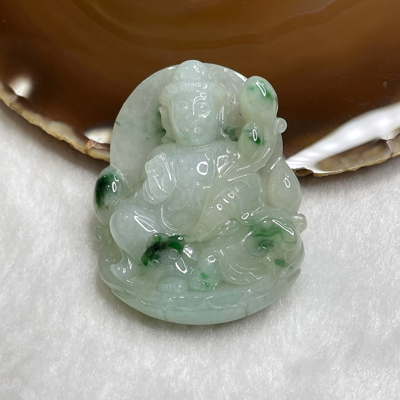 Type A Semi Icy Piao Hua Guan Yin Jade Jadeite 55.08g 52.2 by 42.3 by 13.5mm - Huangs Jadeite and Jewelry Pte Ltd