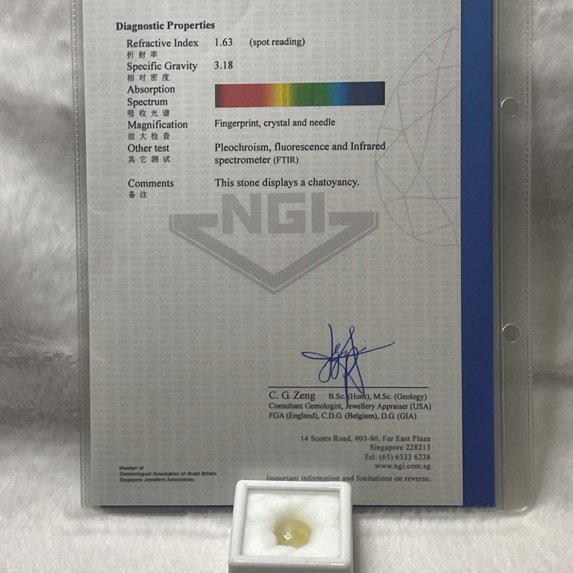 Natural Apatite Cat’s Eye with NGI cert 15.67 carats 15.28 by 13.41 by 8.93mm - Huangs Jadeite and Jewelry Pte Ltd