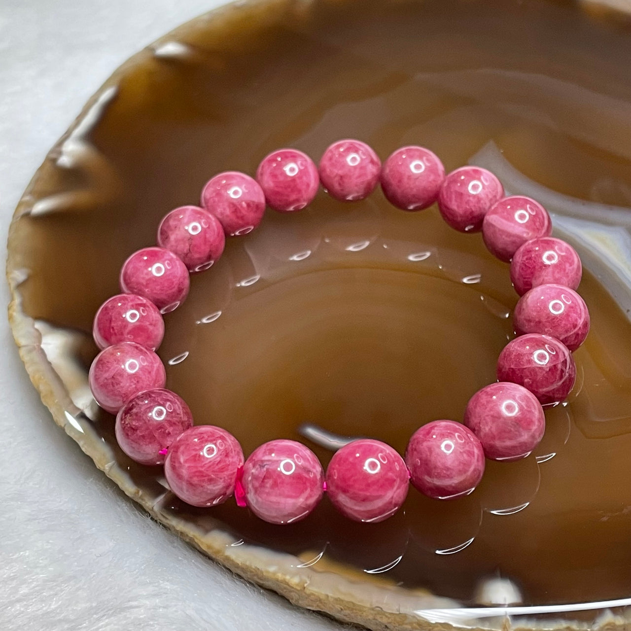 Natural Rhodonite Crystal Bracelet 37.8g 10.3mm/bead 19 beads - Huangs Jadeite and Jewelry Pte Ltd