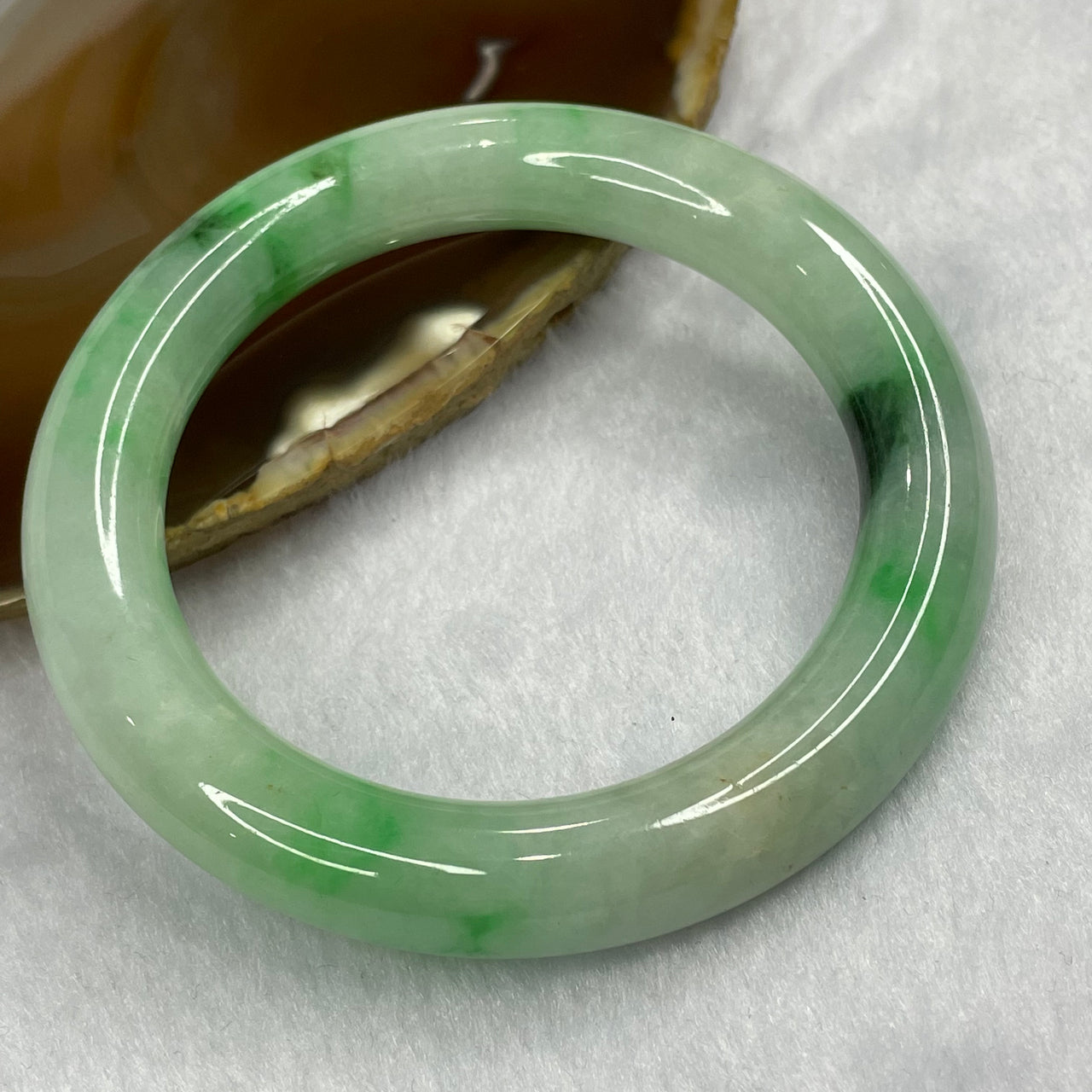 Natural Type A Apple Green with Spicy Green Bangle 64.17g Inner Diameter 55.1 mm 10.8 by 10.8mm - Huangs Jadeite and Jewelry Pte Ltd