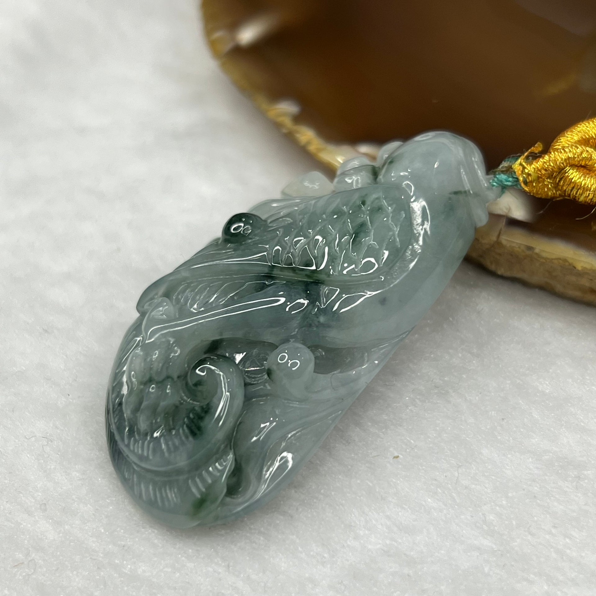 Type A Semi Icy Green Piao Hua Jade Jadeite Parrot 29.51g 50.0 by 26.5 by 12.2mm - Huangs Jadeite and Jewelry Pte Ltd