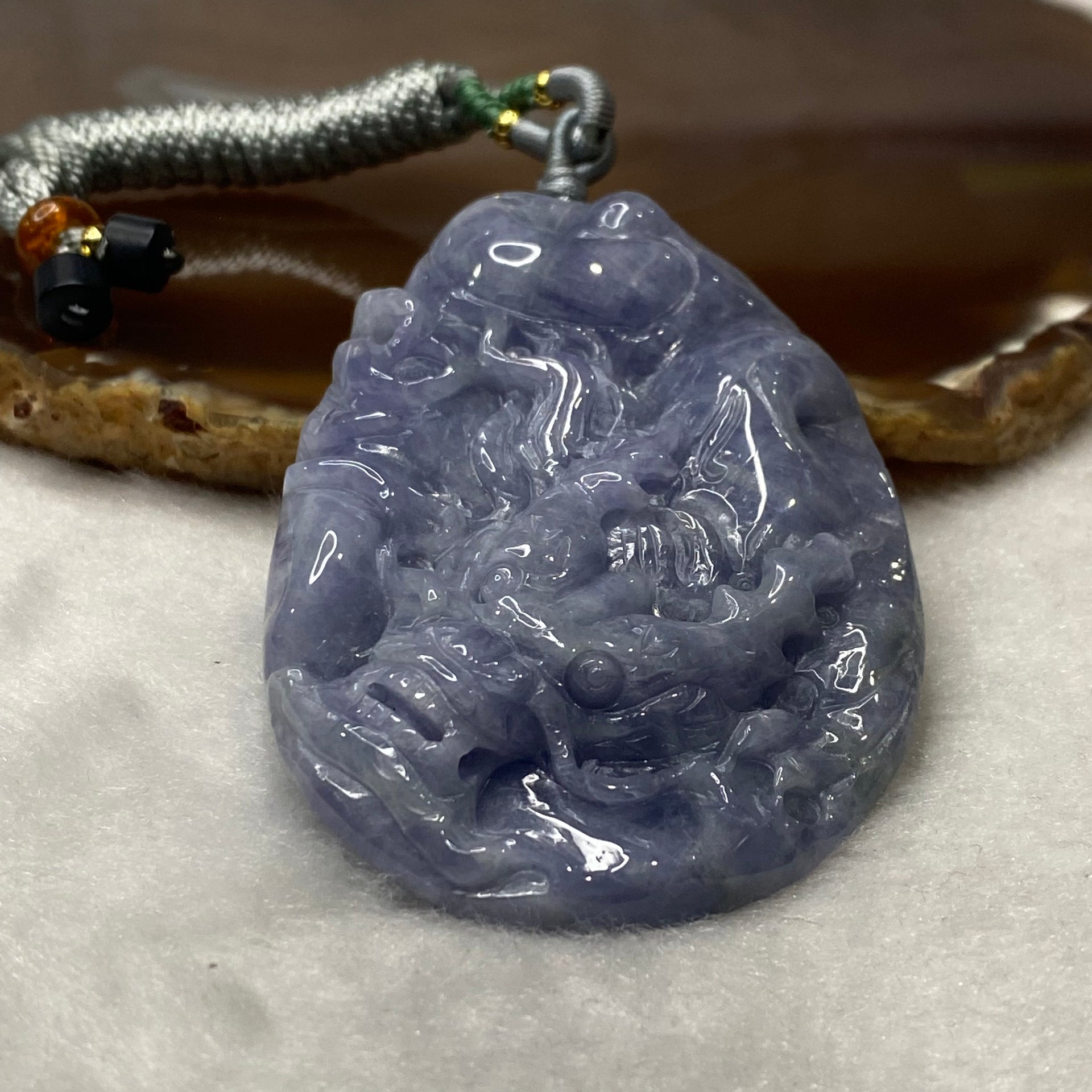 Type A Very Deep Lavender Jadeite Dragon 61.81g 71.1 by 46.9 by 11.8mm - Huangs Jadeite and Jewelry Pte Ltd