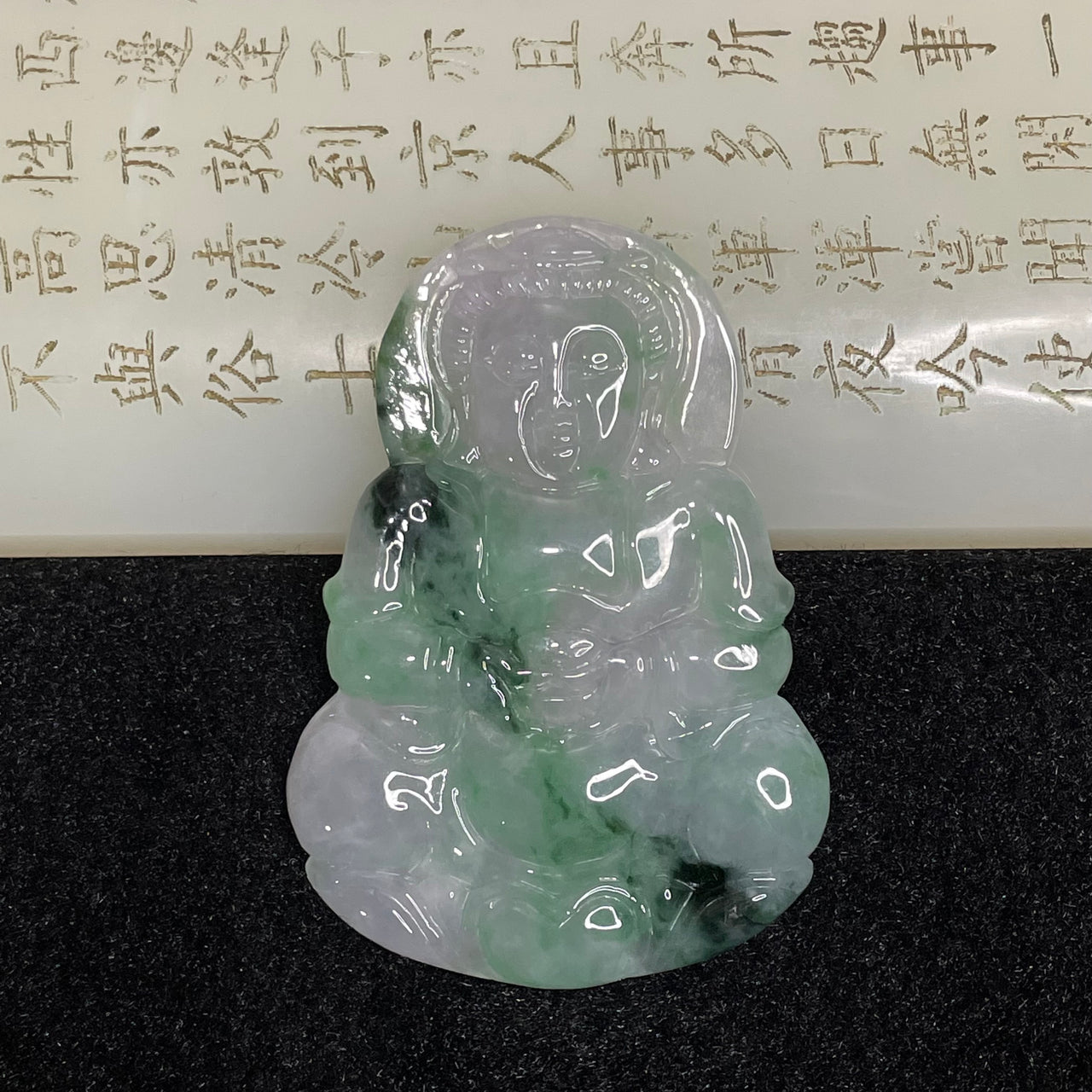 Type A Icy Spicy Green Vein Guan Yin Jade Jadeite 25.68g 62.0 by 43.5 by 5.4mm - Huangs Jadeite and Jewelry Pte Ltd