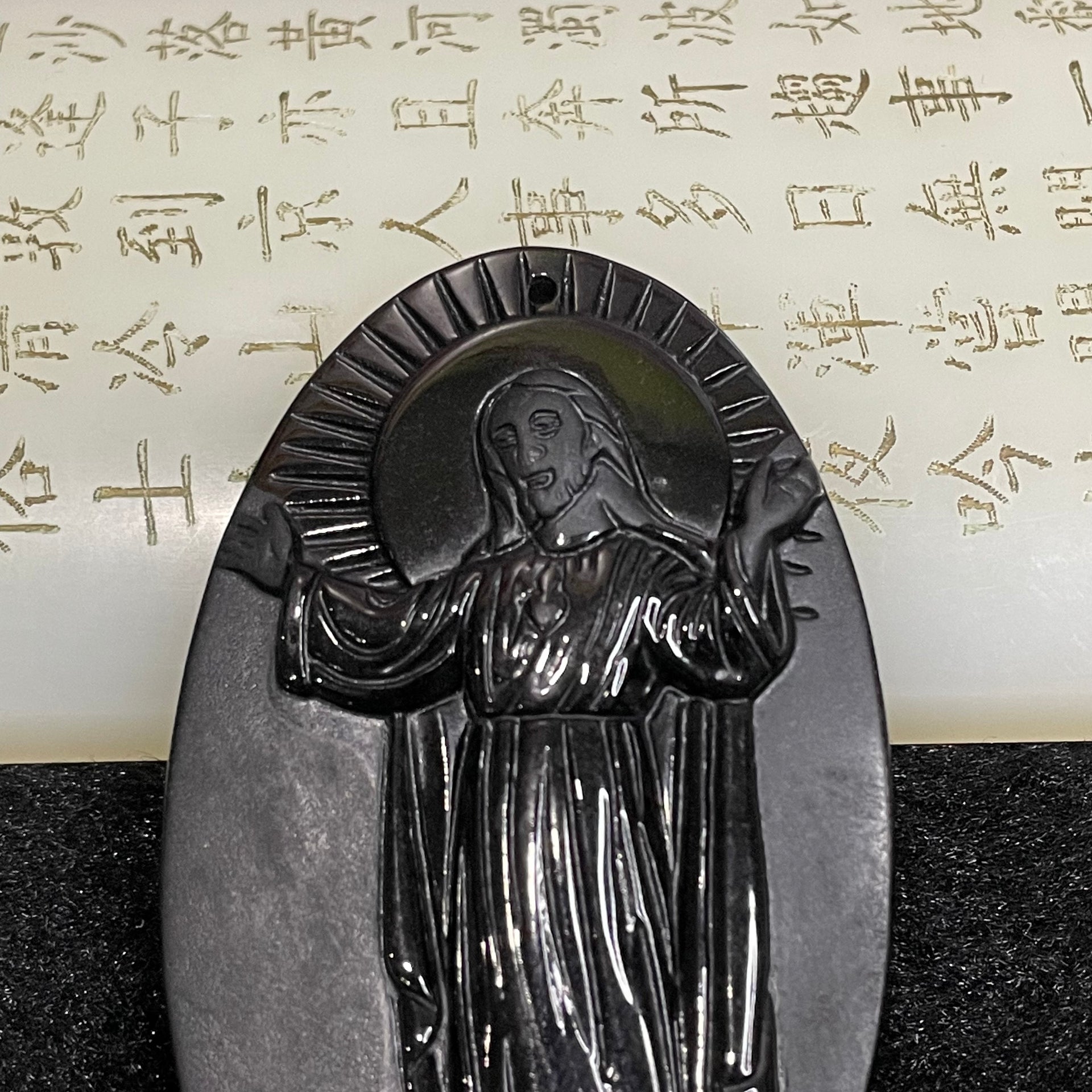 Type A Black Jade Jadeite Jesus 39.98g 69.6 by 40.4 by 8.3mm - Huangs Jadeite and Jewelry Pte Ltd