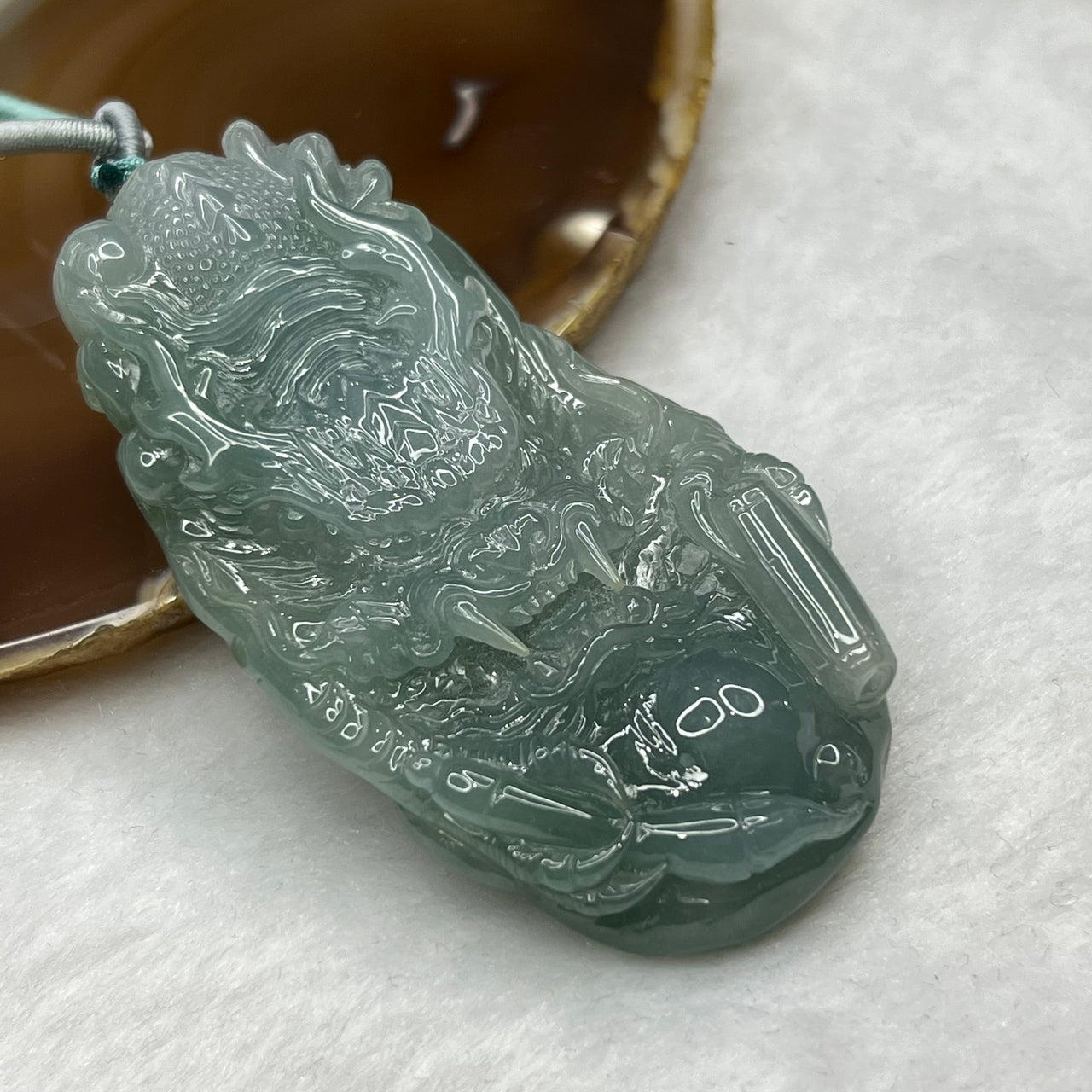 Type A Semi Icy Blueish Green Burmese Jadeite Dragon Pendant 91.78g 80.0 by 42.4 by 14.5mm - Huangs Jadeite and Jewelry Pte Ltd