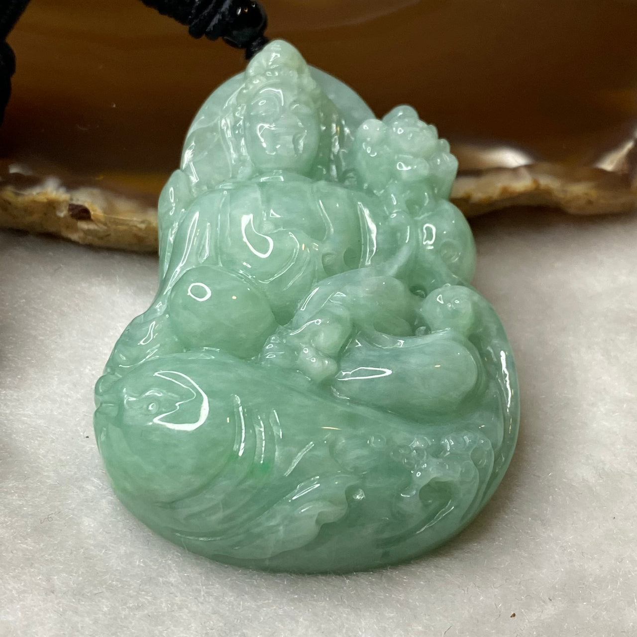 Type A Apple Green Jadeite Guan Yin 62.35g 61.0 by 43.5 by 12.5mm - Huangs Jadeite and Jewelry Pte Ltd