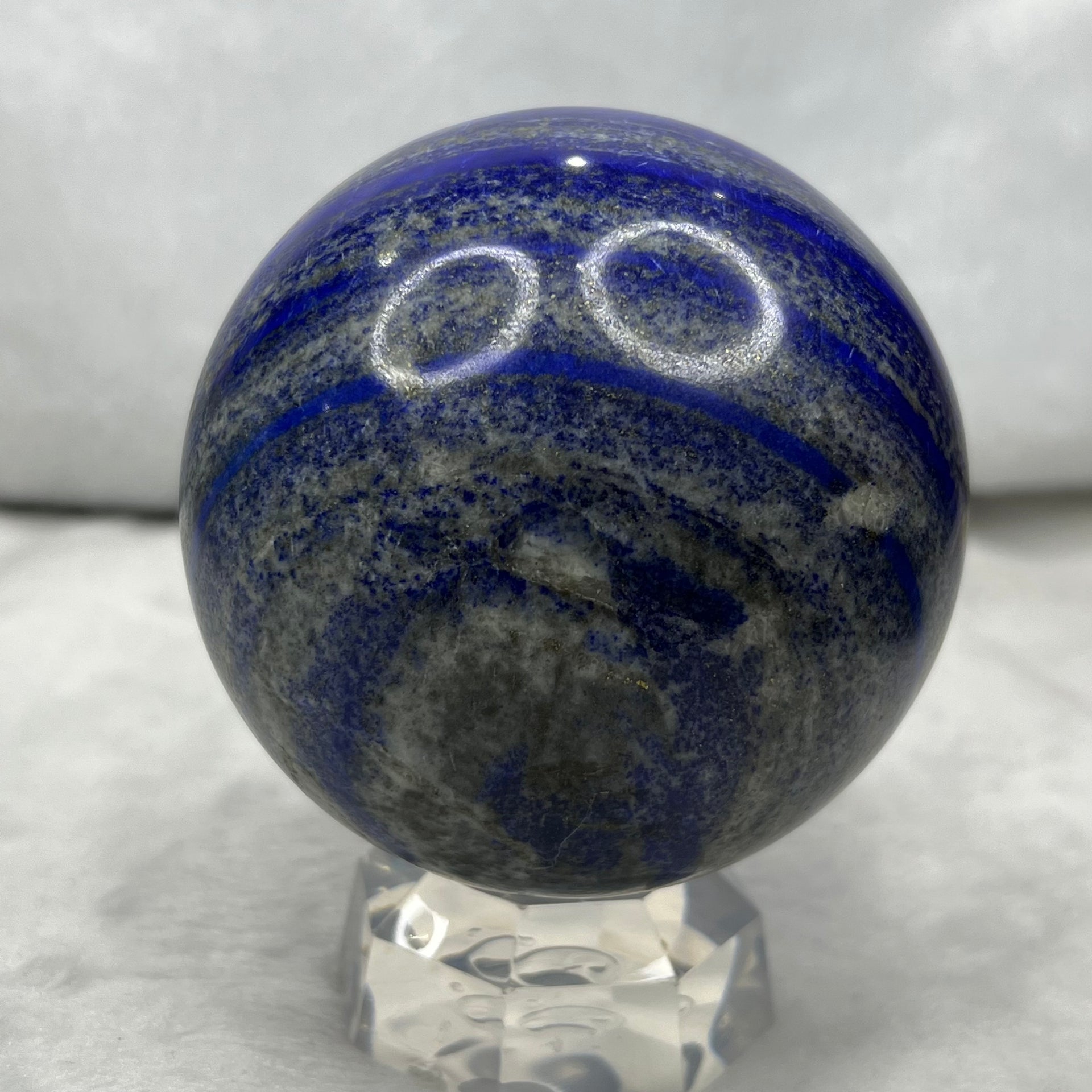 Natural Lapis Lazuli Crystal Ball Display with Stand - 1315g Dimensions with Stand: 110.0 by 92.2 by 92.2 mm Crystal Ball Dimensions: 92.2 by 92.2 mm - Huangs Jadeite and Jewelry Pte Ltd