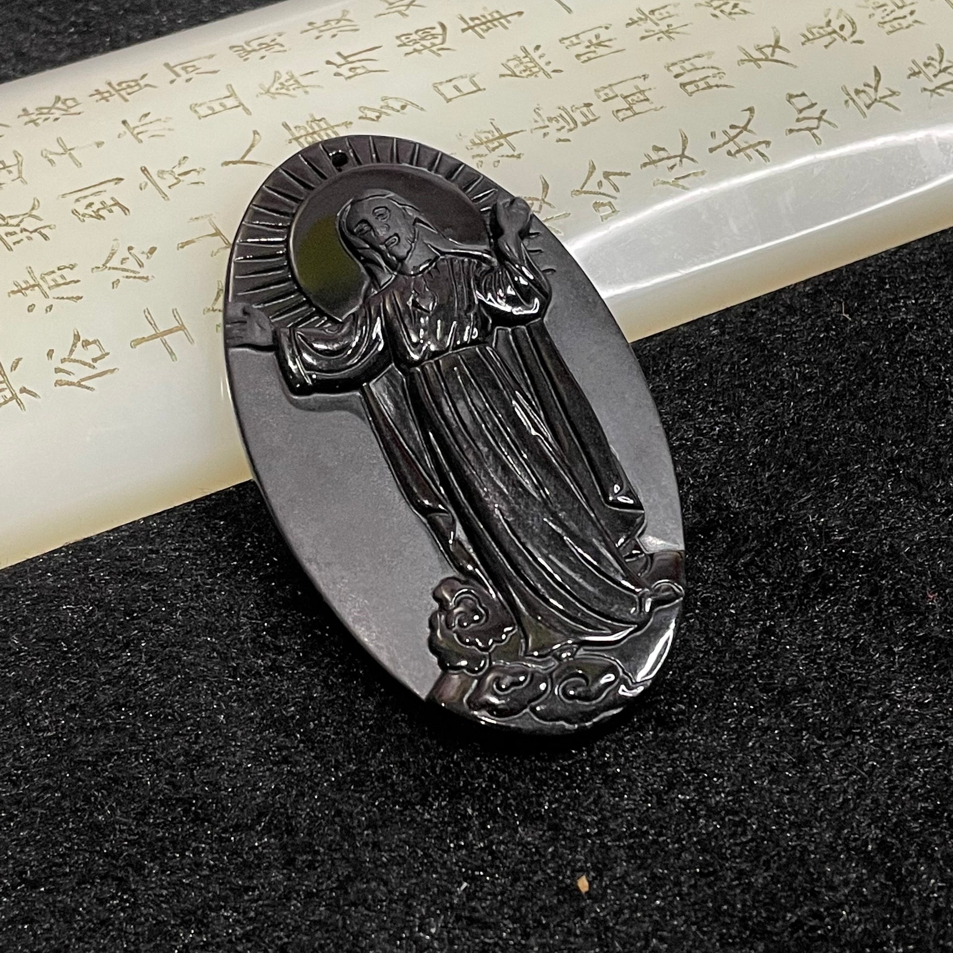 Type A Black Jade Jadeite Jesus 39.98g 69.6 by 40.4 by 8.3mm - Huangs Jadeite and Jewelry Pte Ltd