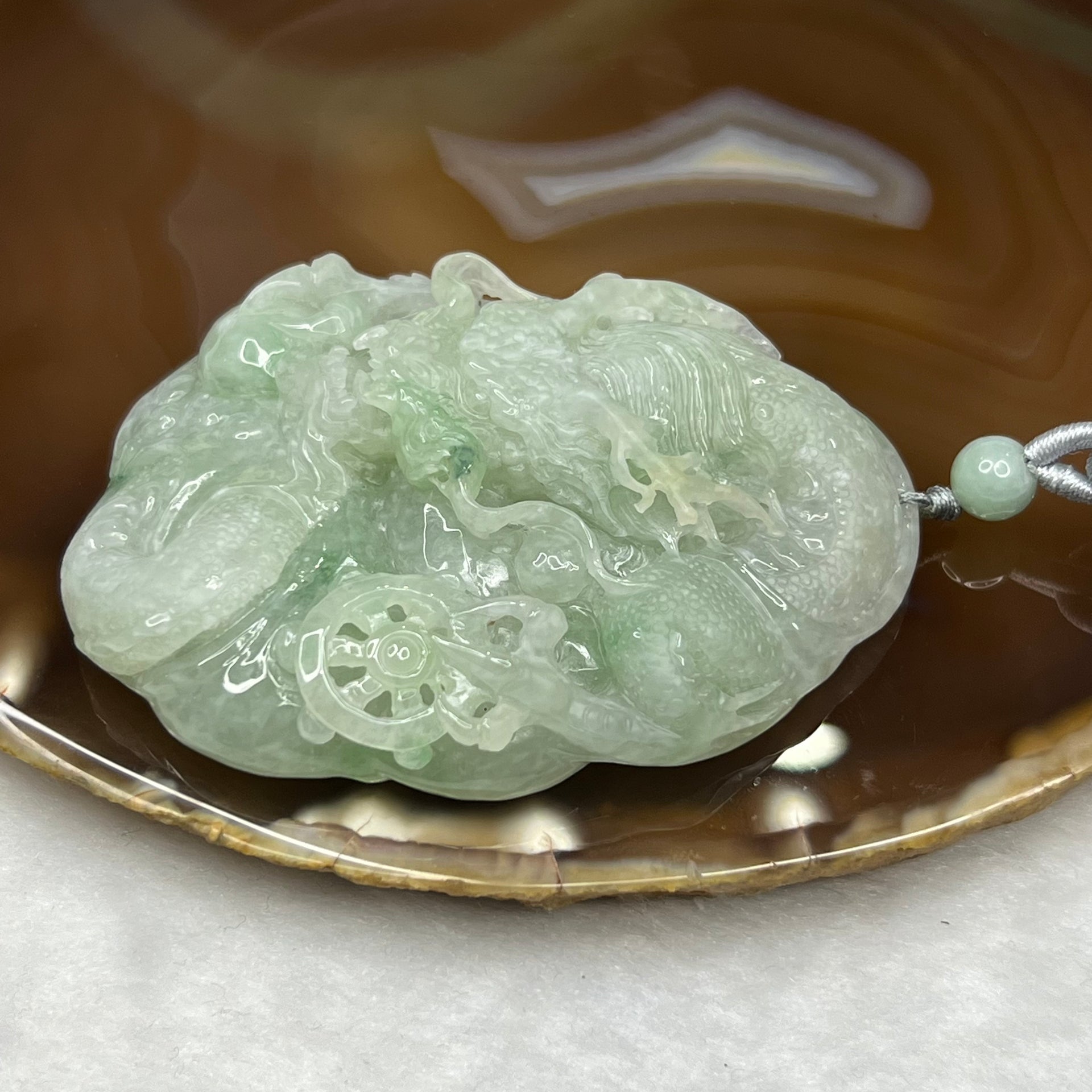 Type A Semi Icy Green Jadeite Dragon Pendant 102.64g 71.2 by 52.0 by 19.3mm - Huangs Jadeite and Jewelry Pte Ltd