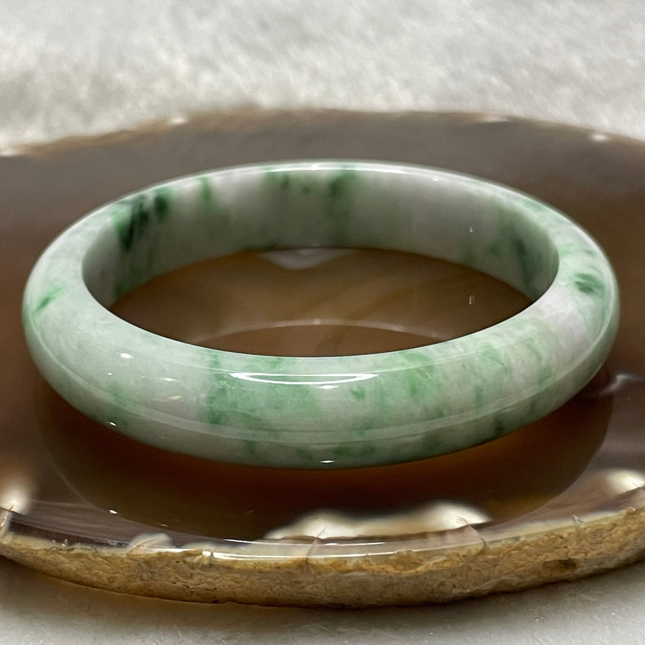 Type A Green Jade Jadeite with Spicy Green Patches Bangle - 56.18g Inner Diameter 59.0mm Thickness 12.6 by 8.2mm - Huangs Jadeite and Jewelry Pte Ltd