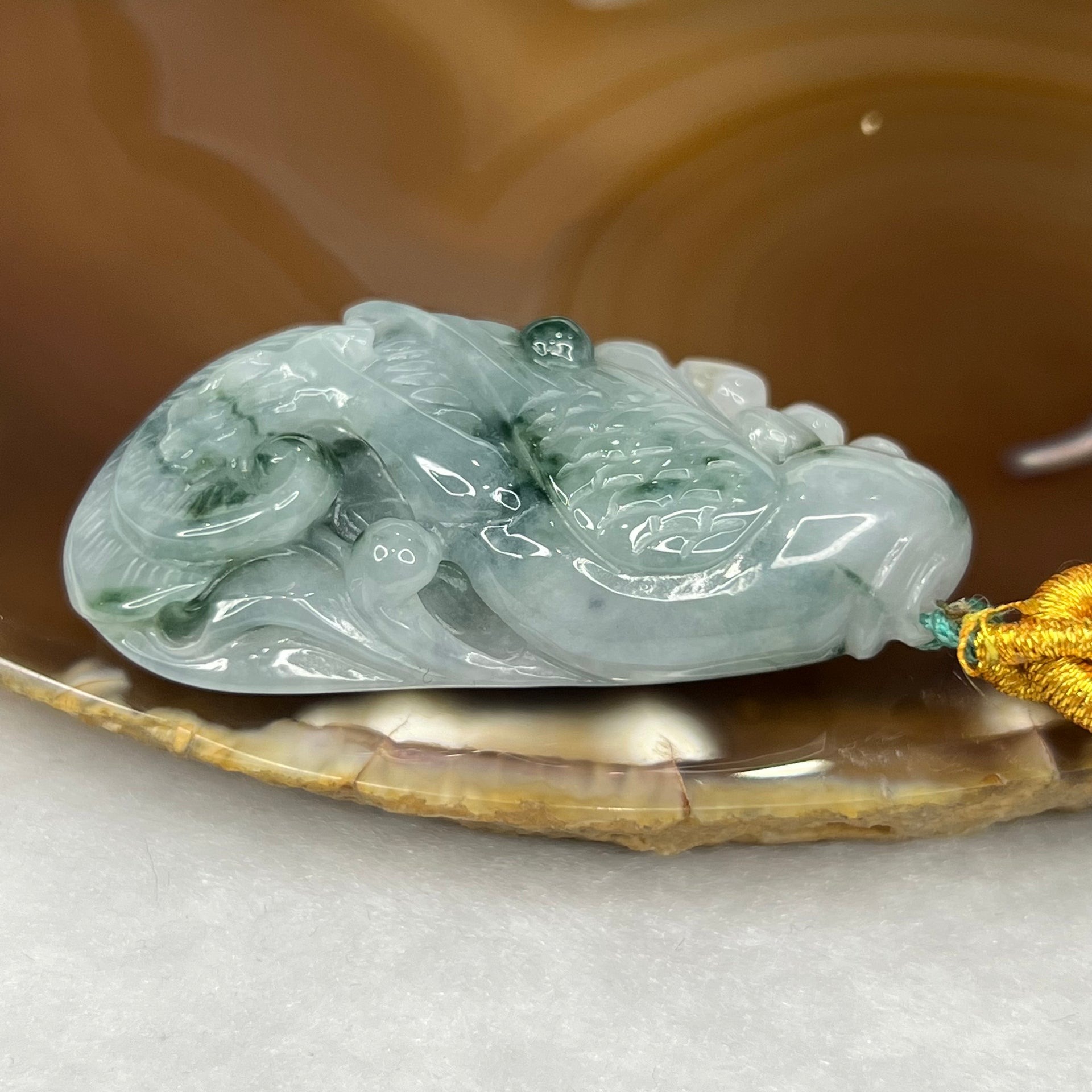 Type A Semi Icy Green Piao Hua Jade Jadeite Parrot 29.51g 50.0 by 26.5 by 12.2mm - Huangs Jadeite and Jewelry Pte Ltd