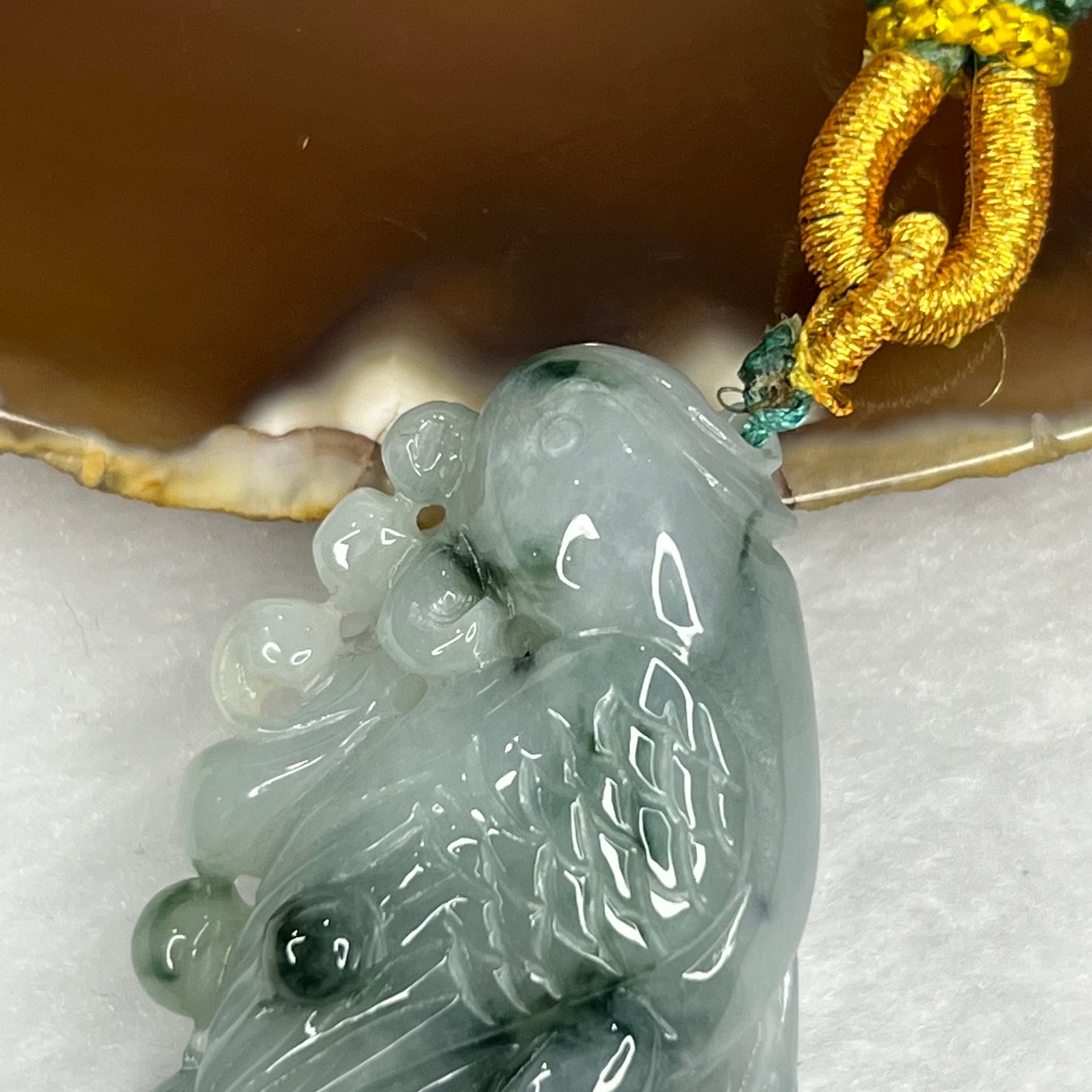 Type A Semi Icy Green Piao Hua Jade Jadeite Parrot 29.51g 50.0 by 26.5 by 12.2mm - Huangs Jadeite and Jewelry Pte Ltd