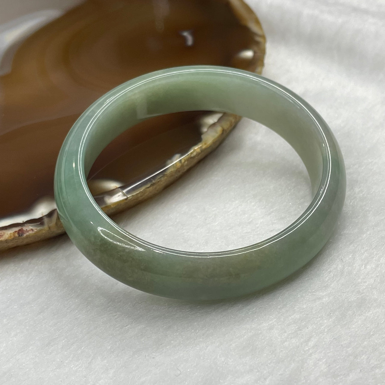 Type A Green Jadeite Oval Bangle (NO LINE) 62.18g inner diameter 54.0mm 13 by 6.7mm - Huangs Jadeite and Jewelry Pte Ltd