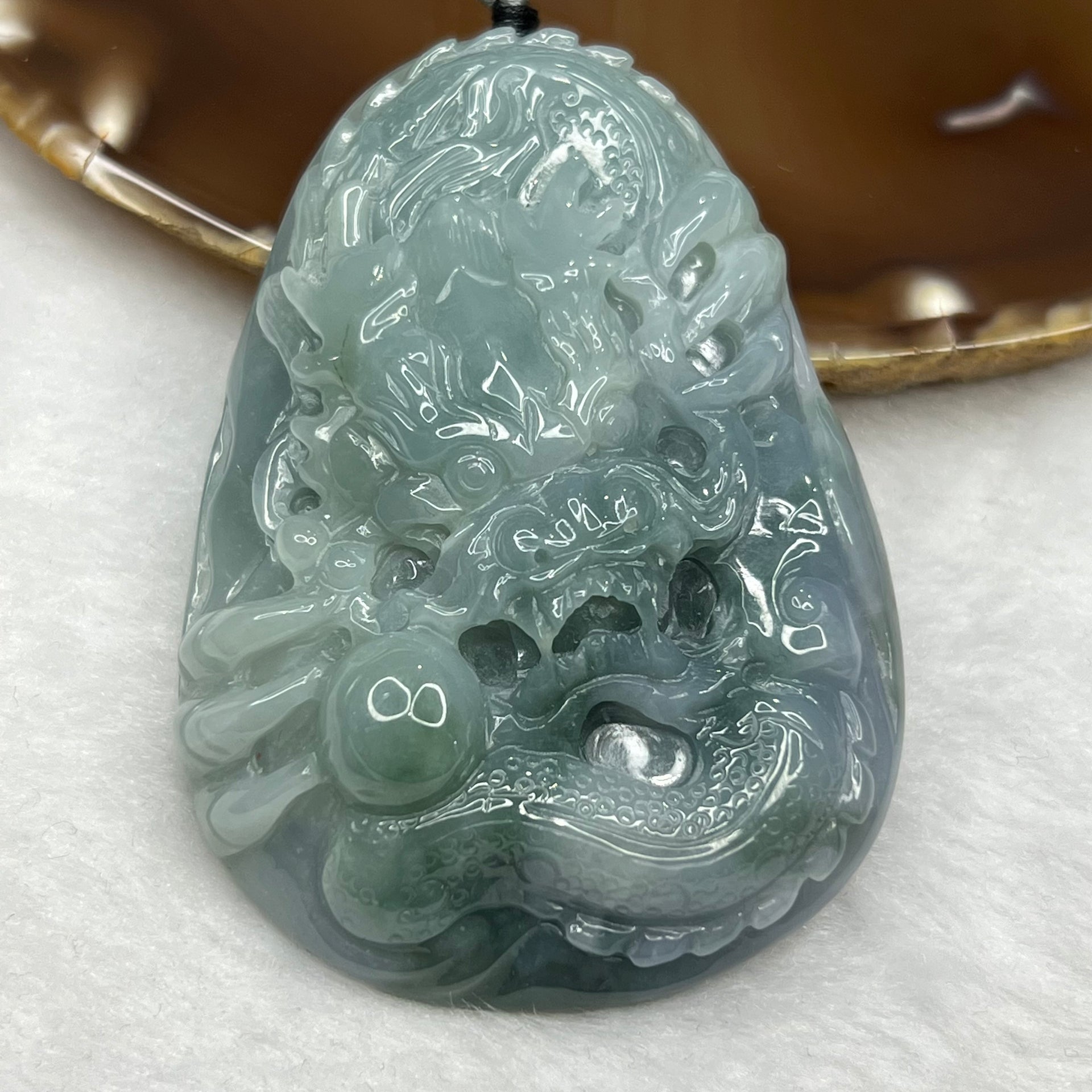 Type A Blueish Green and Lavender Jadeite Dragon Pendant 96.85g 73.0 by 51.0 by 15.8mm Feng Shui SG - Huangs Jadeite and Jewelry Pte Ltd