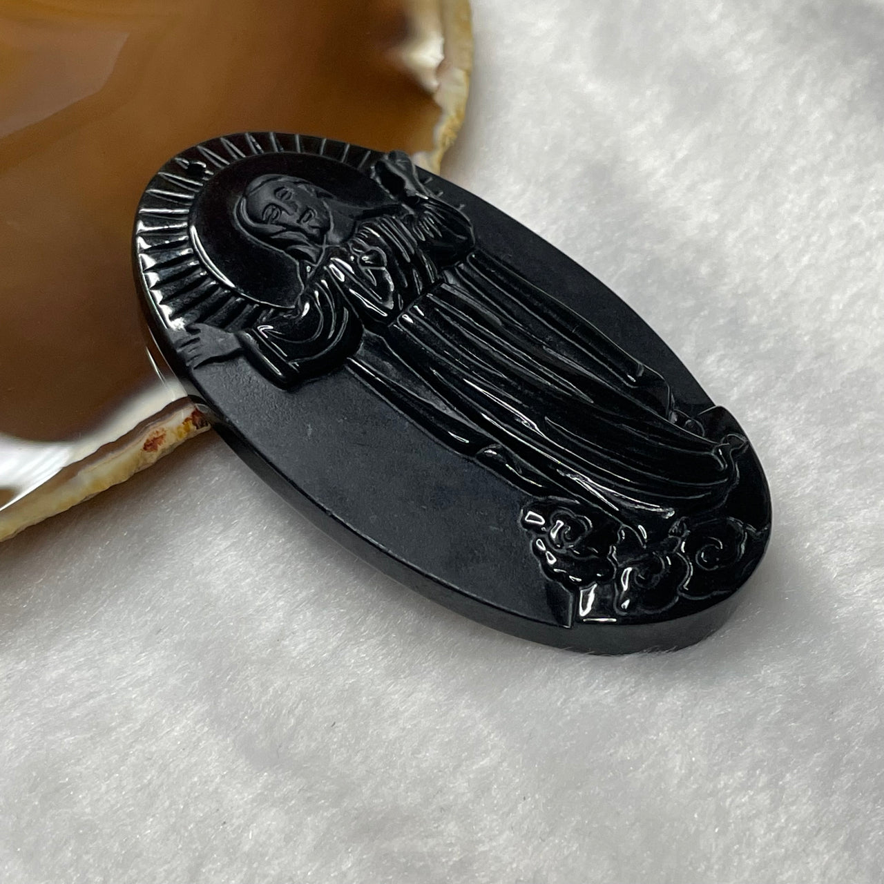 Type A Black Jade Jadeite Jesus 38.56g 68.3 by 39.0 by 7.4mm - Huangs Jadeite and Jewelry Pte Ltd