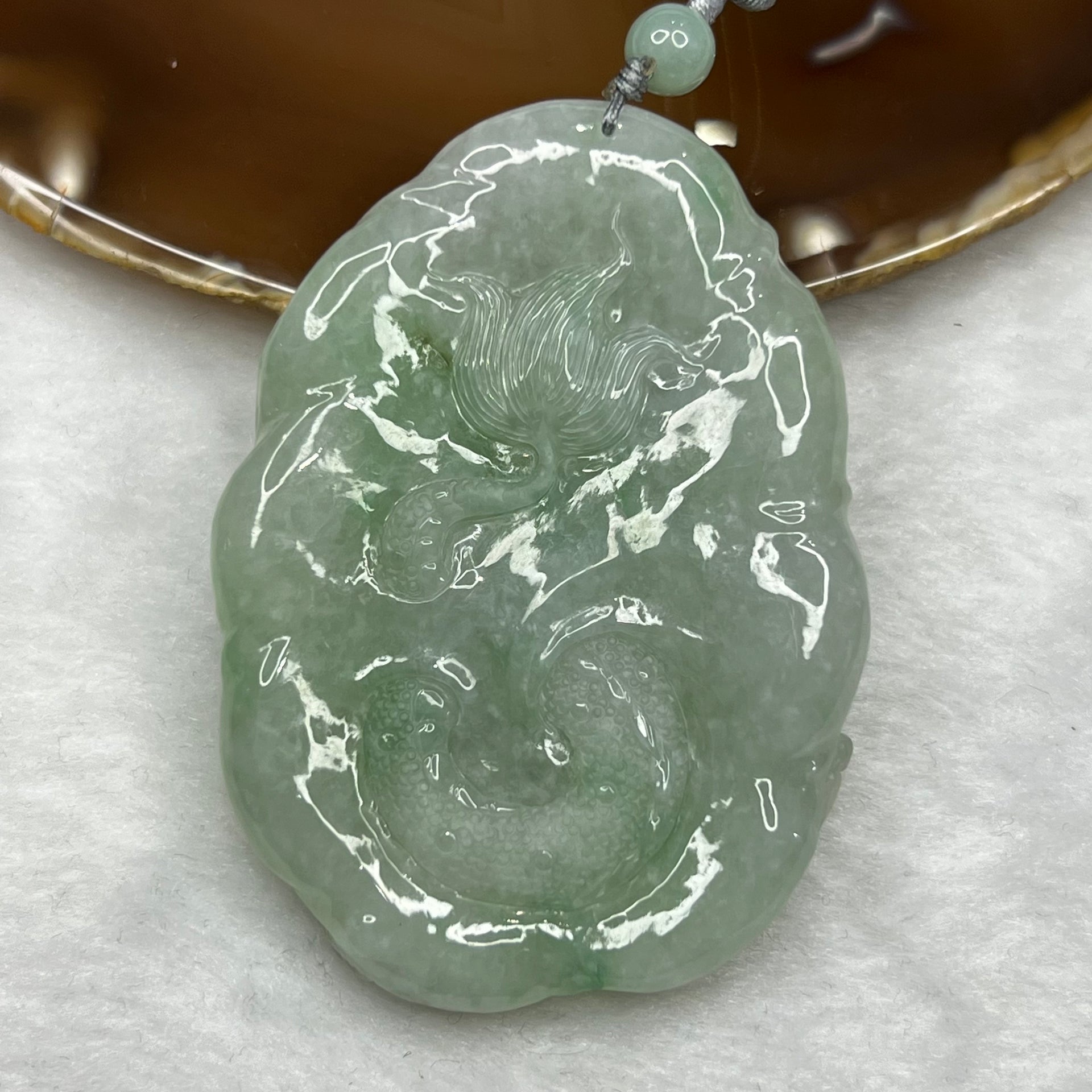 Type A Semi Icy Green Jadeite Dragon Pendant 102.64g 71.2 by 52.0 by 19.3mm - Huangs Jadeite and Jewelry Pte Ltd