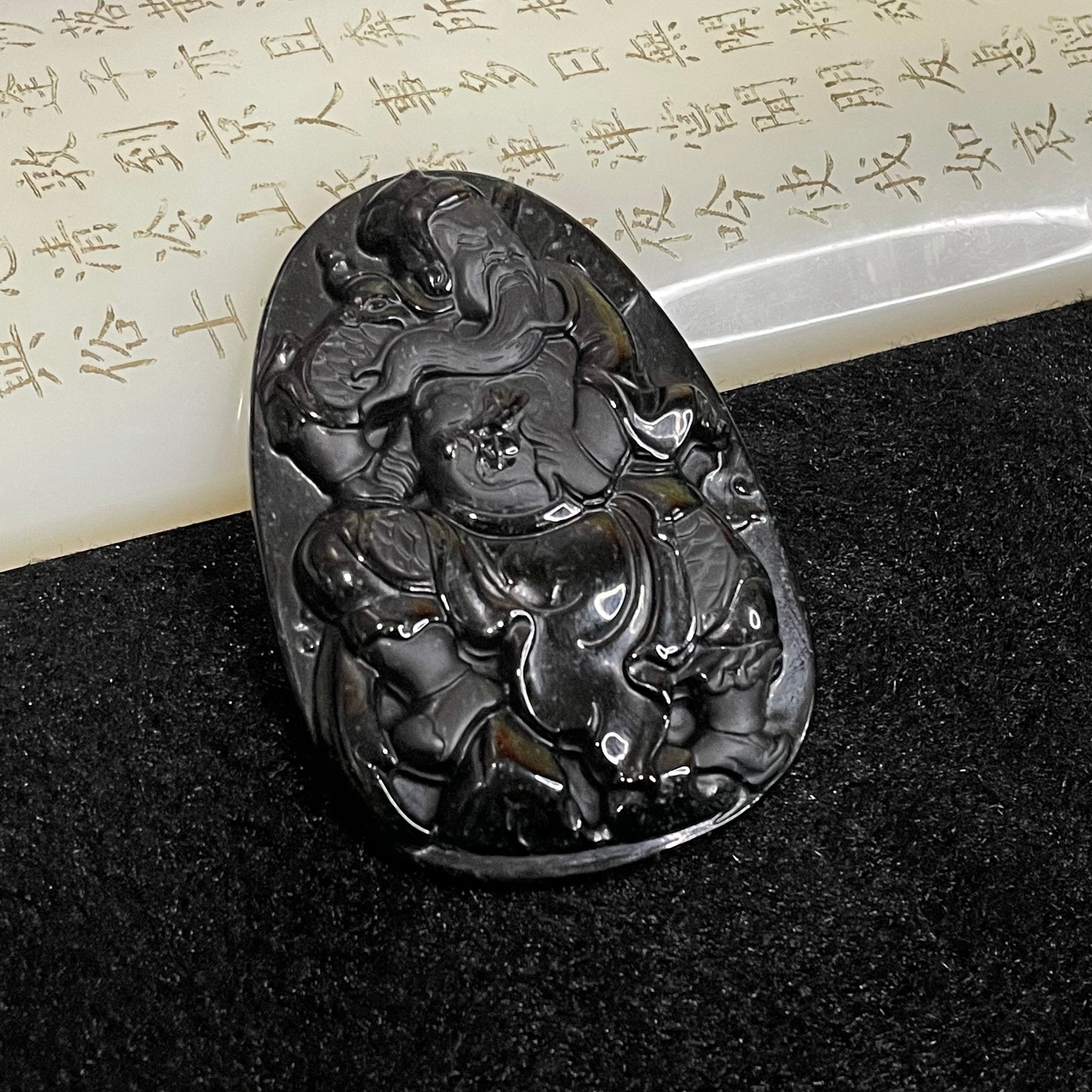 Type A Black Jade Jadeite Guan Gong 35.6g 64.8 by 45.5 by 7.3mm - Huangs Jadeite and Jewelry Pte Ltd