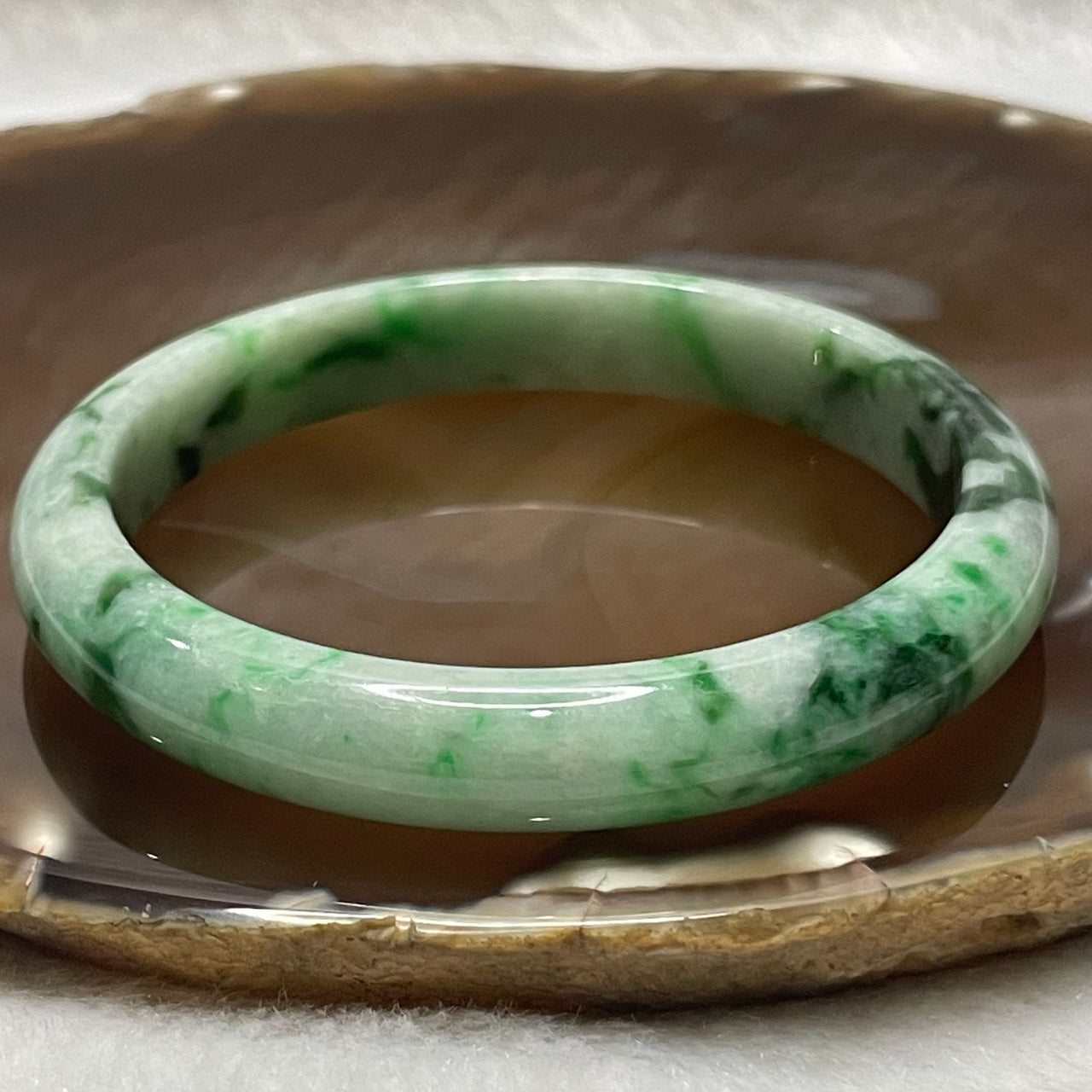 Type A Light Green with Green Patches Jade Jadeite Bangle - 35.02g Inner Diameter 56.8mm Thickness 9.9 by 6.8mm - Huangs Jadeite and Jewelry Pte Ltd