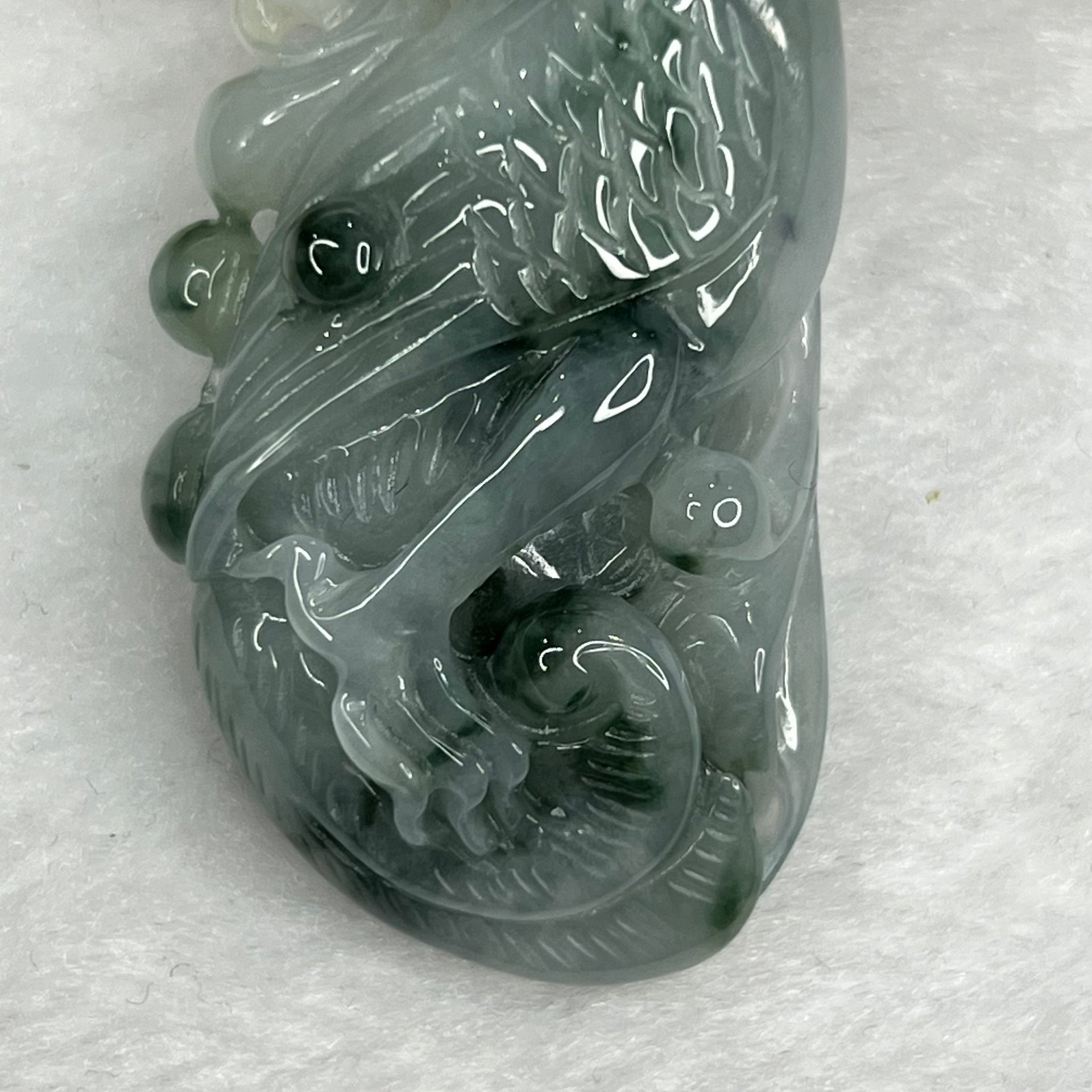 Type A Semi Icy Green Piao Hua Jade Jadeite Parrot 29.51g 50.0 by 26.5 by 12.2mm - Huangs Jadeite and Jewelry Pte Ltd